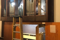 Installing the treble pipes in the display chest.