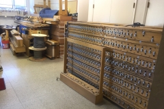 Organ parts filling the choir room.